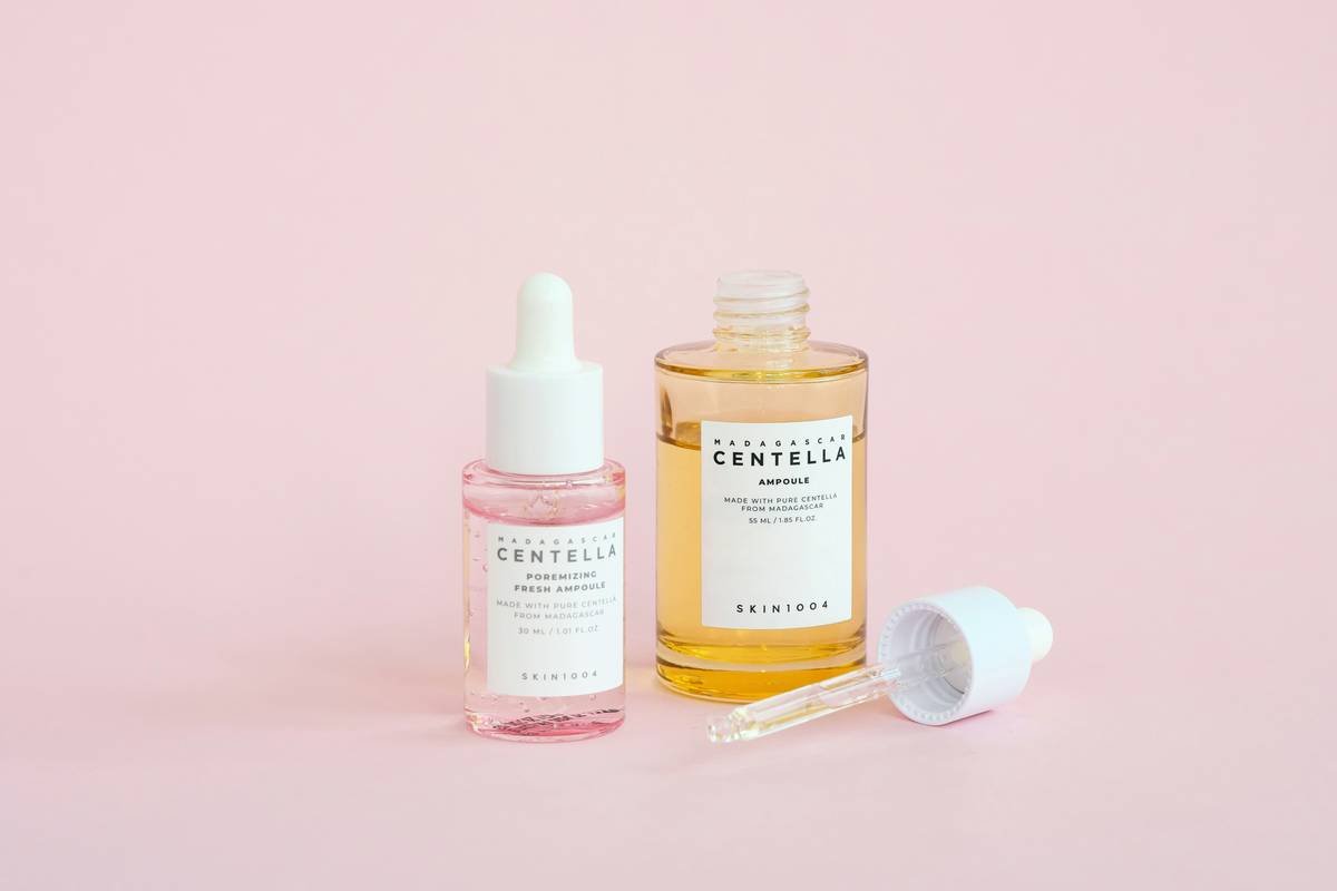 woman applying lightweight tinted moisturizer sensitive skin with fingertips for seamless blend
